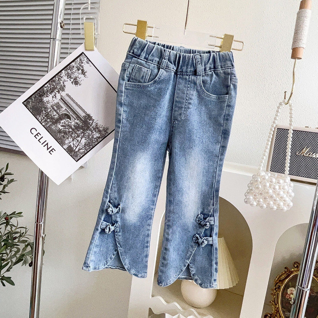 Pantalón pata ancha jeans con detalles de moños