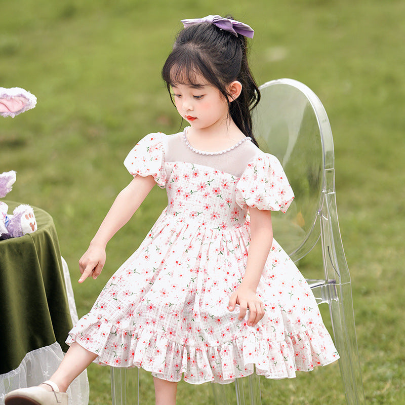 Vestido con detalles de perlas  y estampa de flores con volados