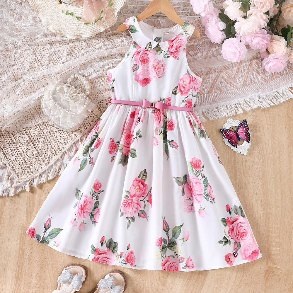 Vestido blanco cuello alto con estampas de flores y cinto rosa