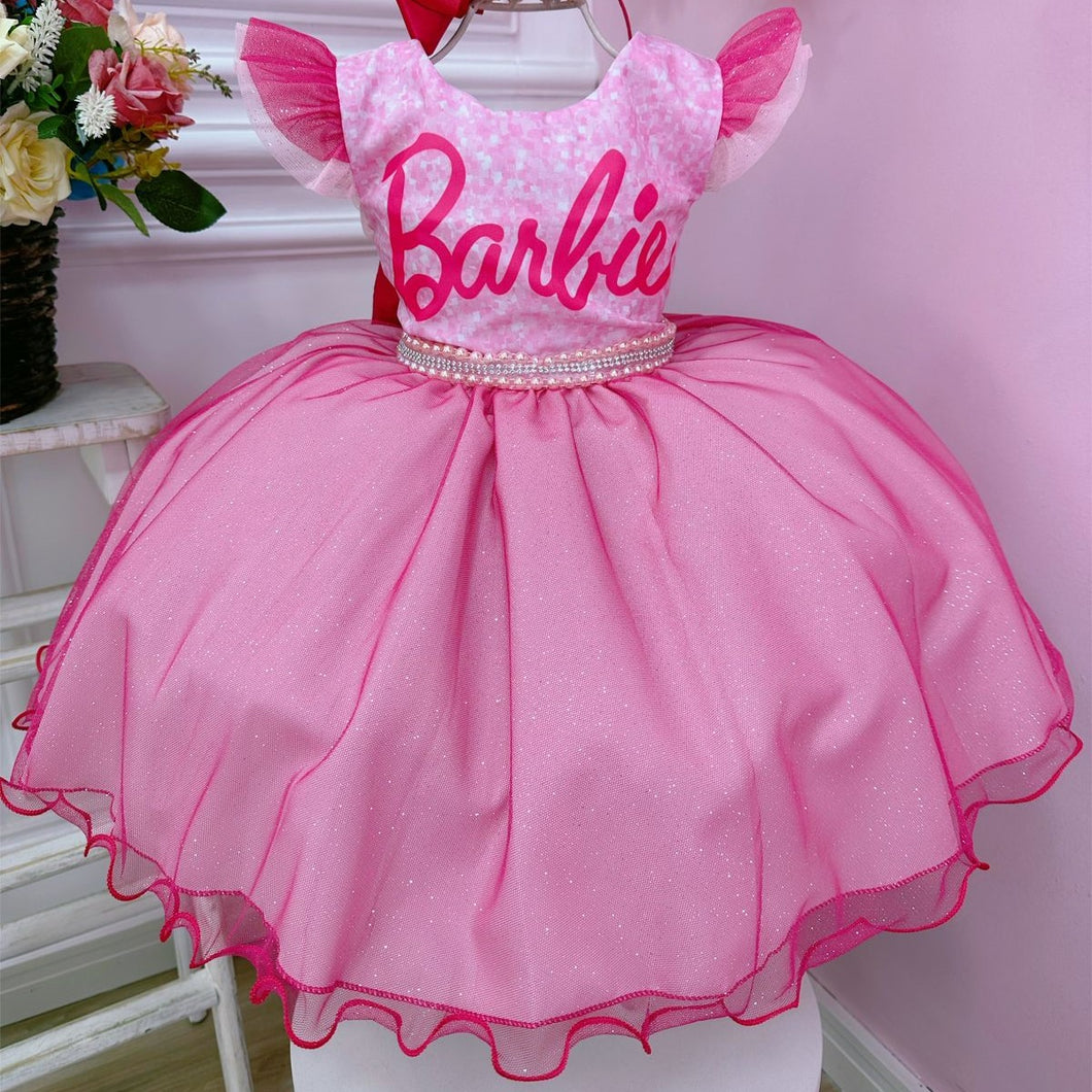 Vestido rosa con perlas y brillo de Barbie con moño