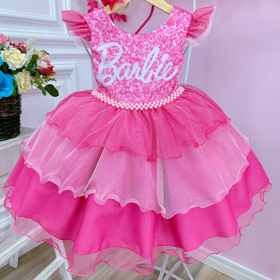 Vestido escalonado rosa con perlas de Barbie y moño