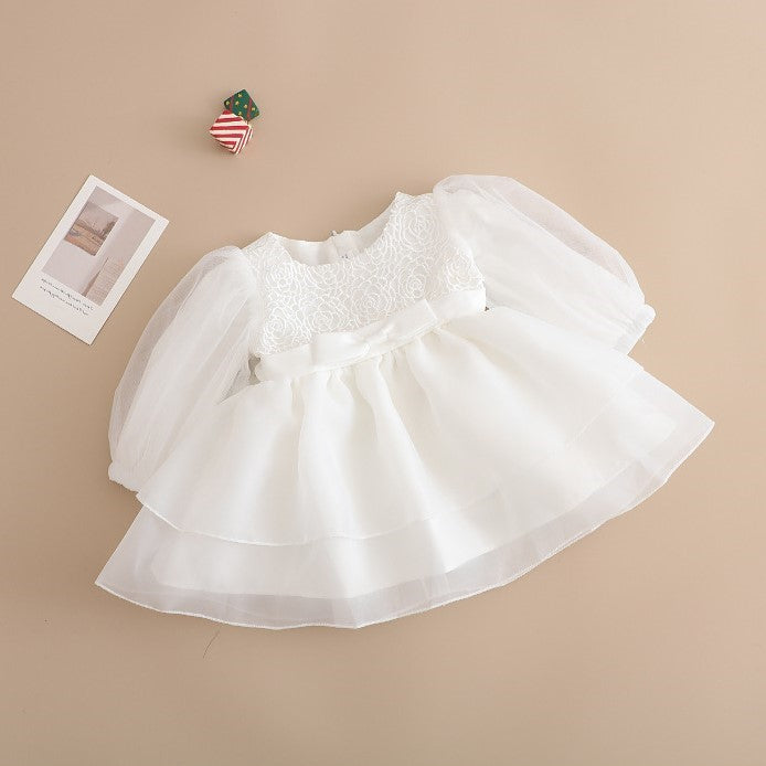 Vestido manga larga blanco de tul con detalle de flores y moño