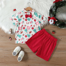 Cargar imagen en el visor de la galería, Camisa blanca con estampas navideñas , moño y short rojo
